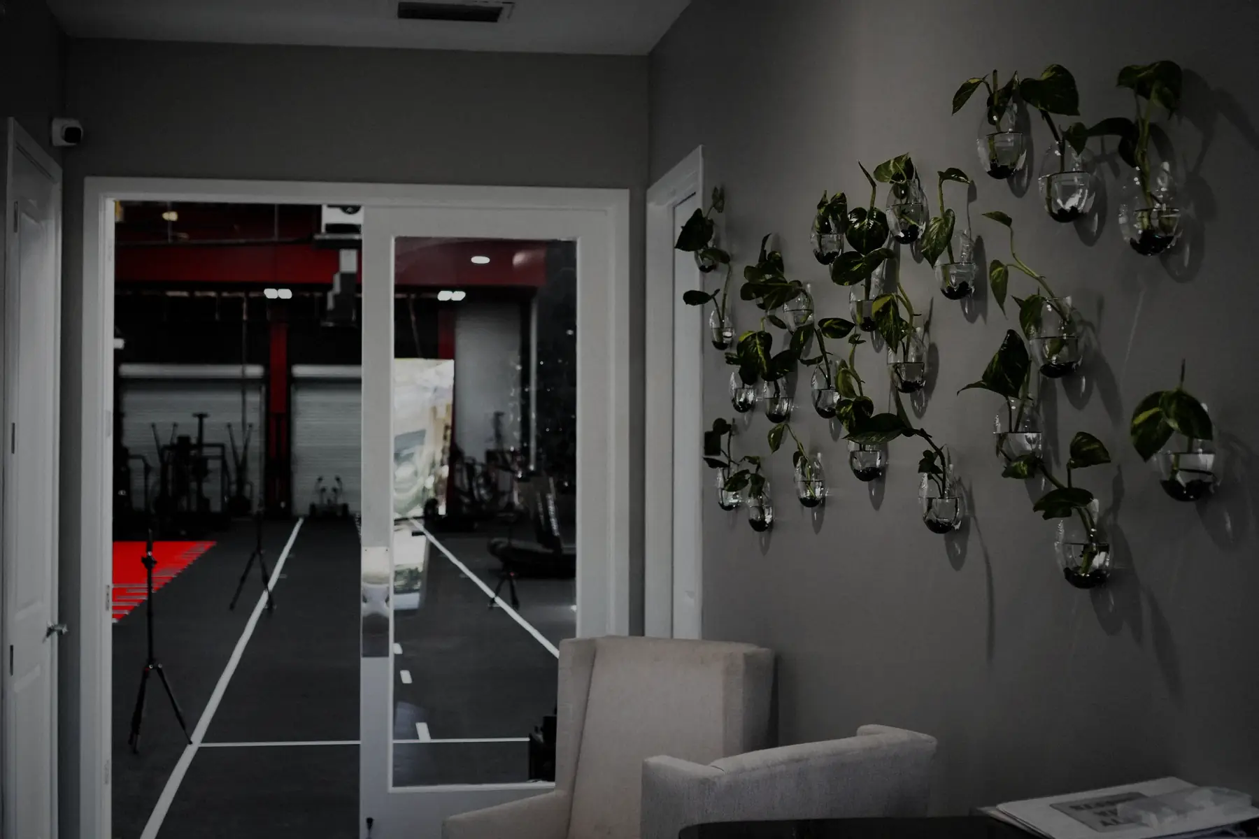 The MaxOut360 entrance and lobby, looking through the glass doors to the training floor
