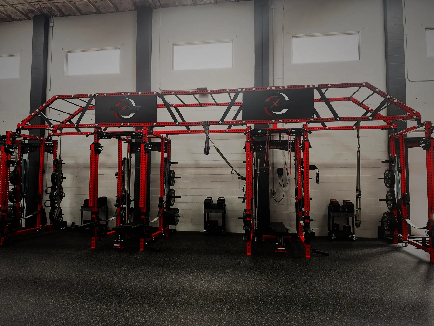 Connected red Sorinex rigs on the MaxOut360 training floor