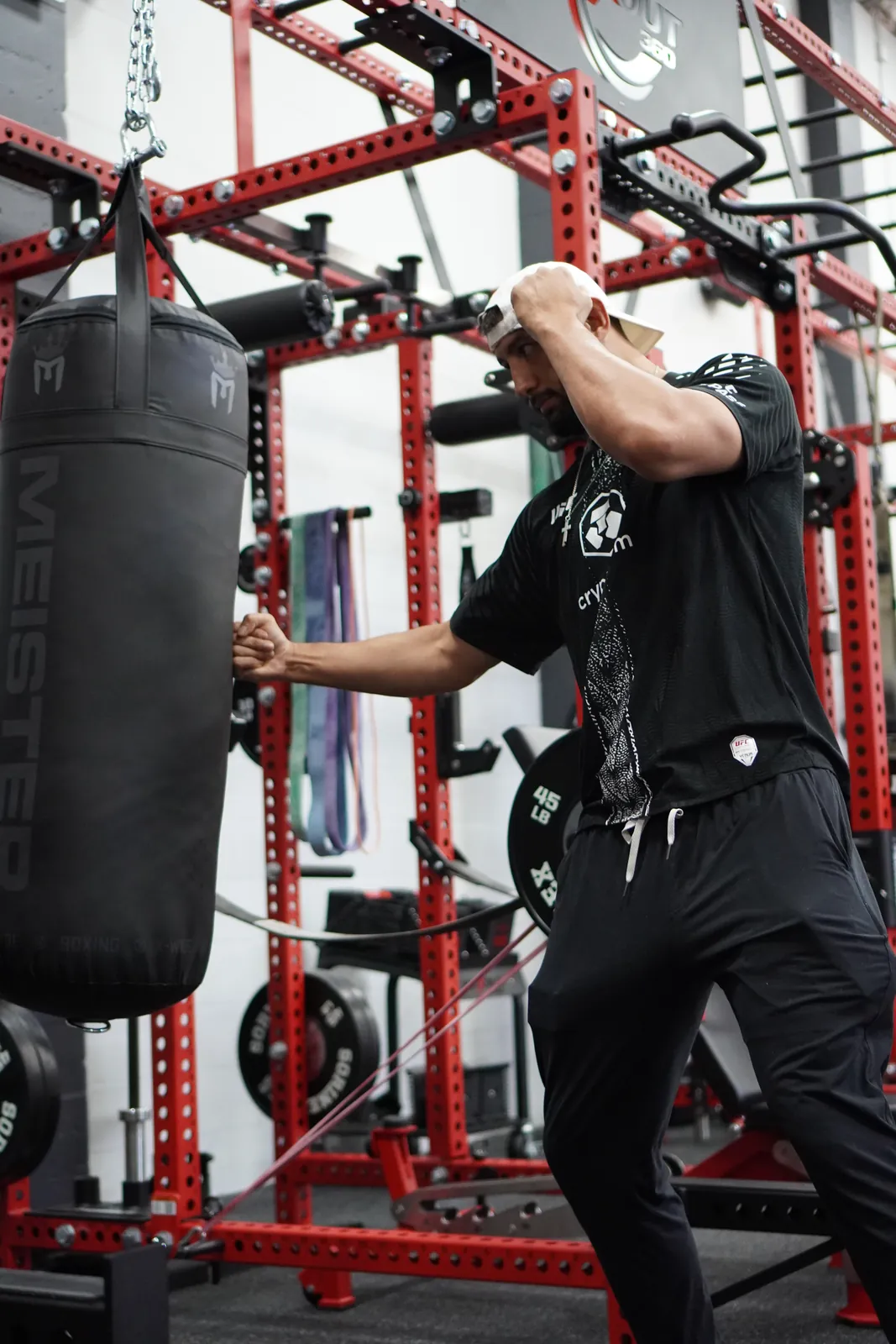 A member working the heavy bag