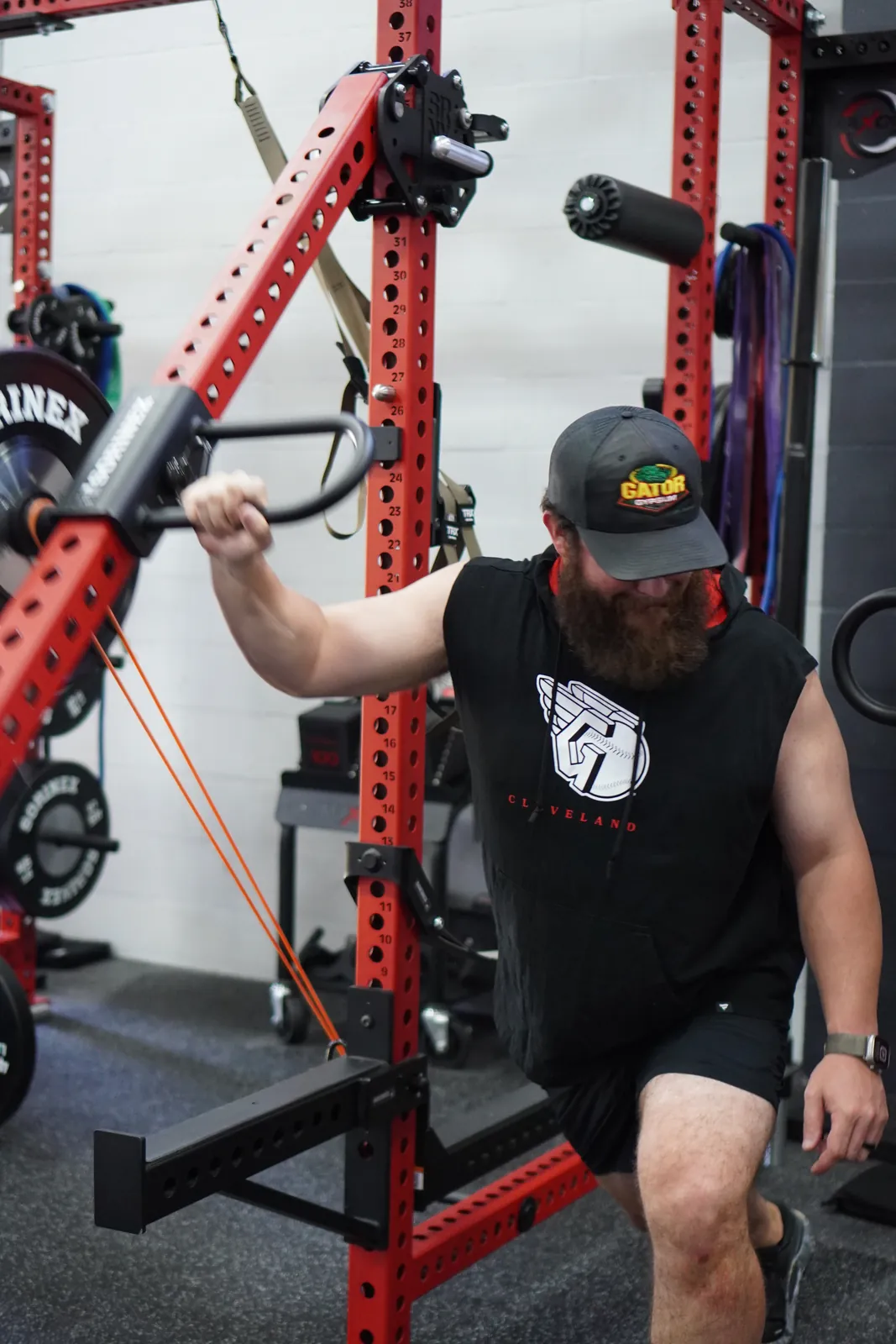 A member doing a cable lunge at the Sorinex rig