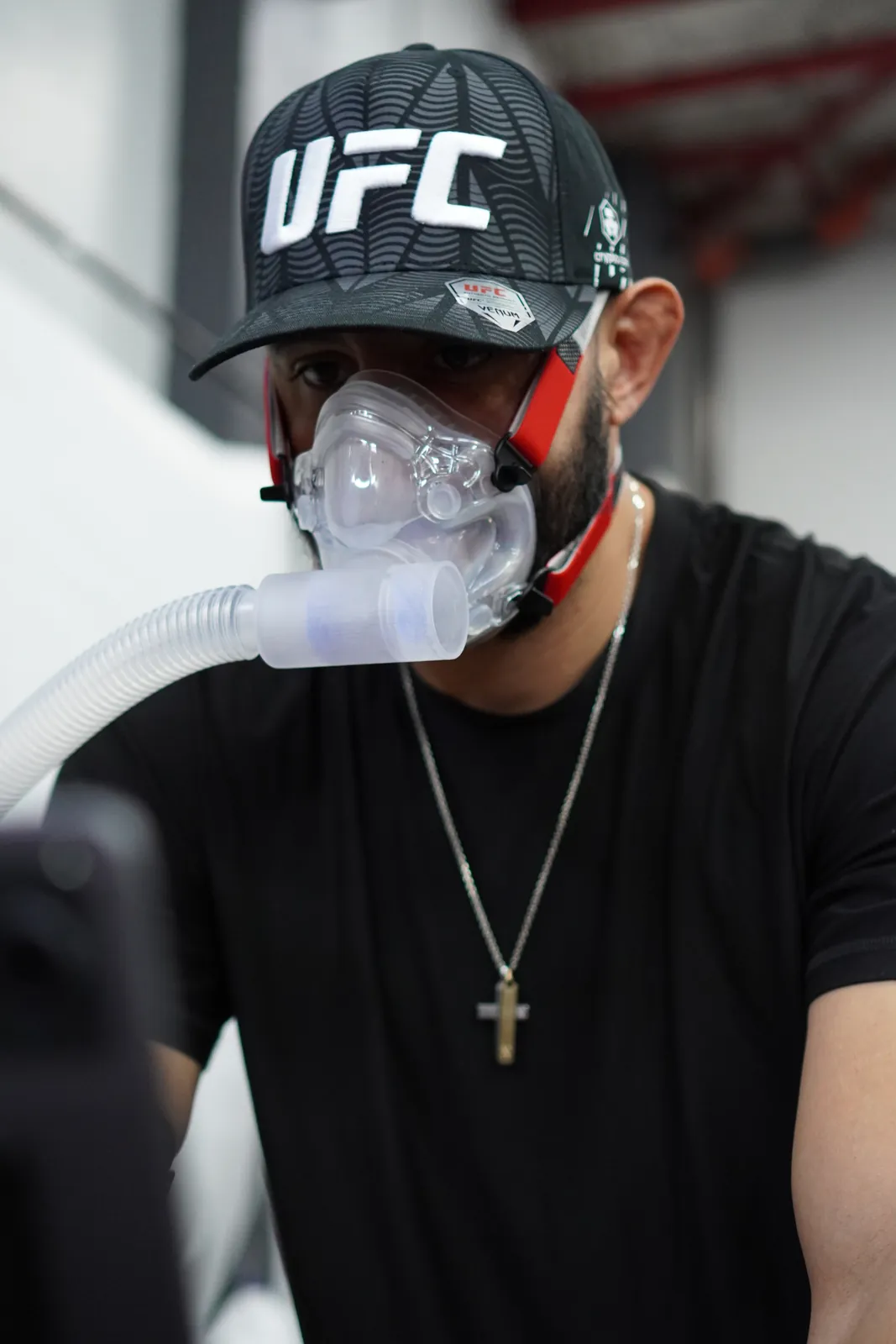 A member in the PNOĒ mask during metabolic testing